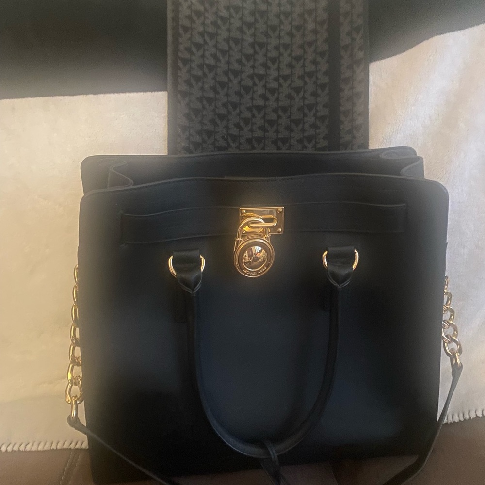 Michael Kors purse only used once,I also have original tags.